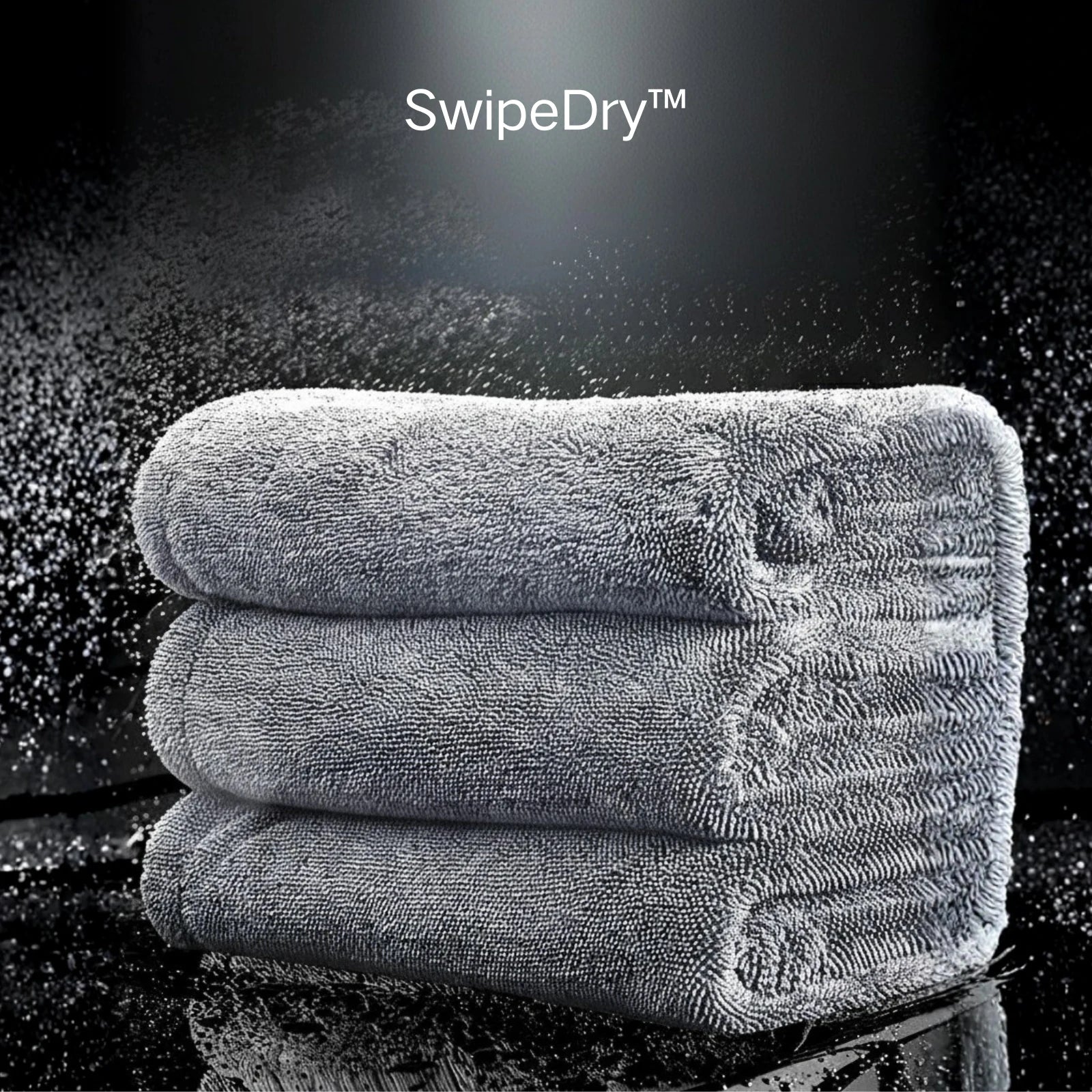 Large 24x80 inch microfiber drying towel drying an SUV hood in one pass without streaks.