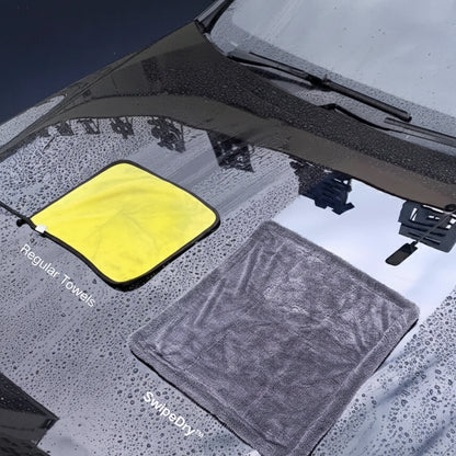 Medium size microfiber towel drying car door jambs and wheels.